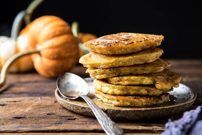 Spiced Pumpkin Cinnamon Roll Pancakes | halfbakedharvest.com #pumpkin #pumpkinpancakes #brunch #breakfast #easyrecipes horizontal photo of Spiced Pumpkin Cinnamon Roll Pancakes