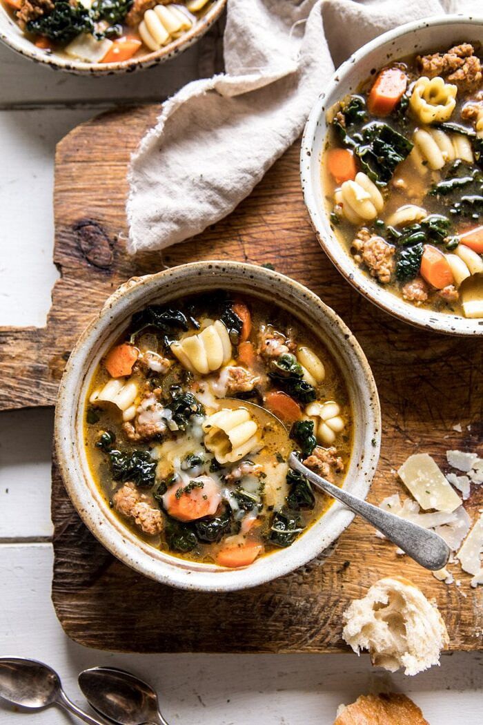 Spicy Italian Pesto Noodle Soup | halfbakedharvest.com #soup #easyrecipes #Italian #fall #autumn #winter #healthy overhead photo of Spicy Italian Pesto Noodle Soup with spoon in bowl