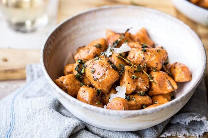 Sweet Potato Gnocchi with Herbed White Wine Pan Sauce | #fallrecipes #simple #cozyrecipes #sweetpotato #gnocchi horizontal photo of Sweet Potato Gnocchi with Herbed White Wine Pan Sauce