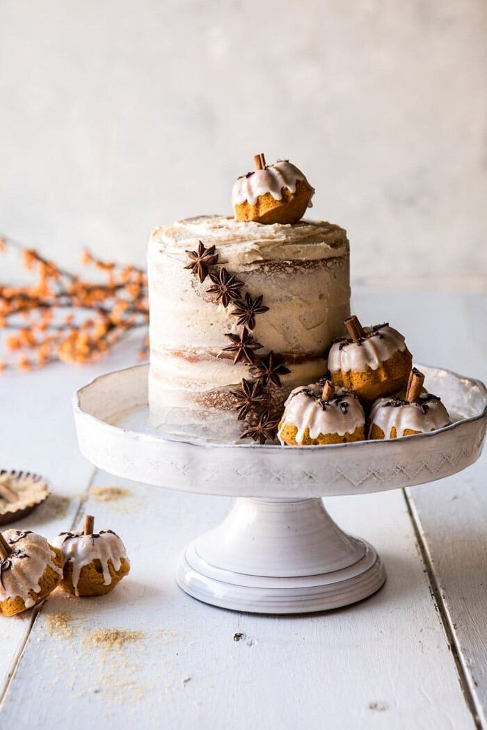 Chai Pumpkin Cake with Maple Browned Butter Frosting | halfbakedharvest.com #pumpkin #chai #fall #autumn #thanksgiving front on photo of Chai Pumpkin Cake with Maple Browned Butter Frosting