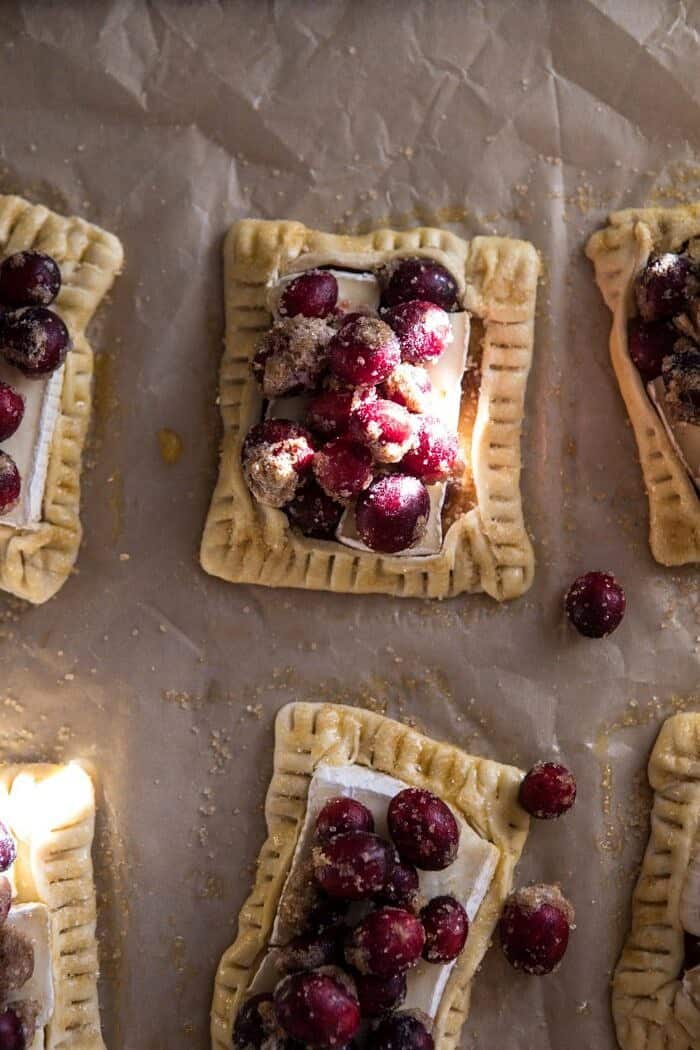 Cranberry Brie Pastry Tarts | halfbakedharvest.com #brie #cranberries #appetizers #thanksgiving #christmas tarts before baking