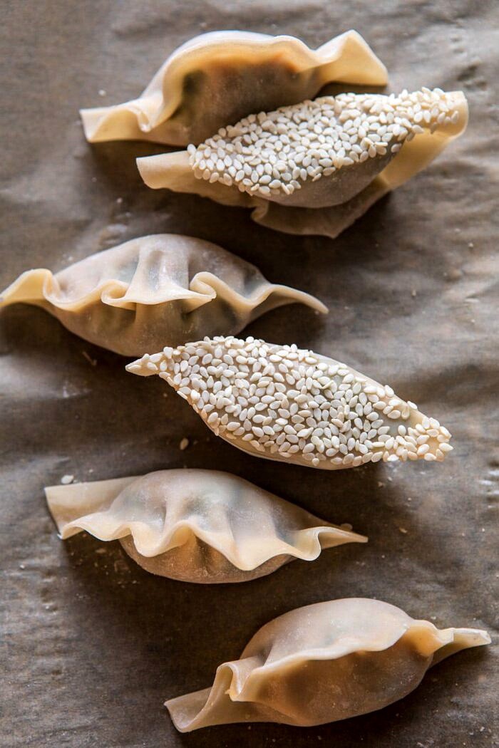 Ginger Sesame Chicken Potstickers with Sweet Chili Pomegranate Sauce | halfbakedharvest.com #asianrecipes #potstickers #dumplings #healthy Ginger Sesame Chicken Potstickers before cooking