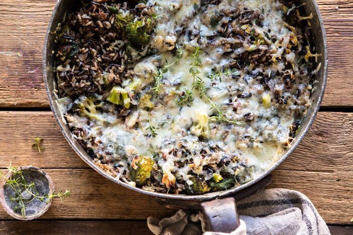 One Pan Broccoli Cheese Wild Rice Casserole | halfbakedharvest.com #wildrice #broccoli #casserole #fall #winter #easyrecipes #healthy horizontal overhead photo of One Pan Broccoli Cheese Wild Rice Casserole
