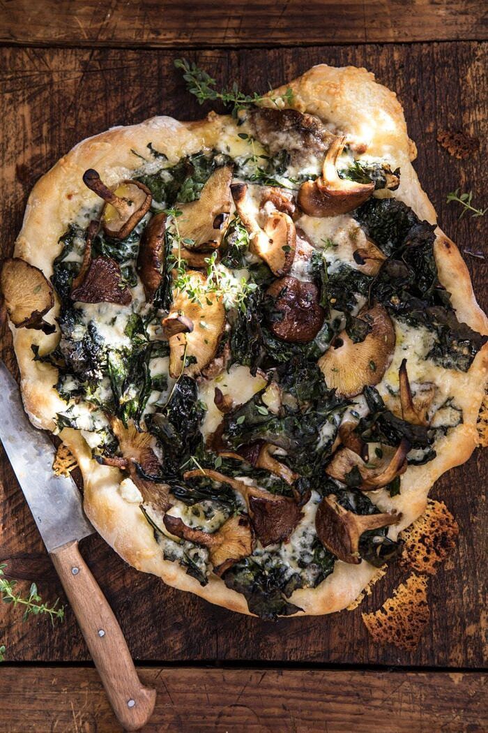 Roasted Mushroom Kale Pizza | halfbakedharvest.com #pizza #mushrooms #winter #fall #autumn #kale #Italian overhead photo of Roasted Mushroom Kale Pizza
