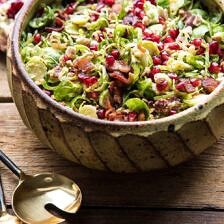 Shredded Brussels Sprout Bacon Salad with Warm Cider Vinaigrette | halfbakedharvest.com #brusselssprouts #salad #thanksgiving #fall #winter #healthy