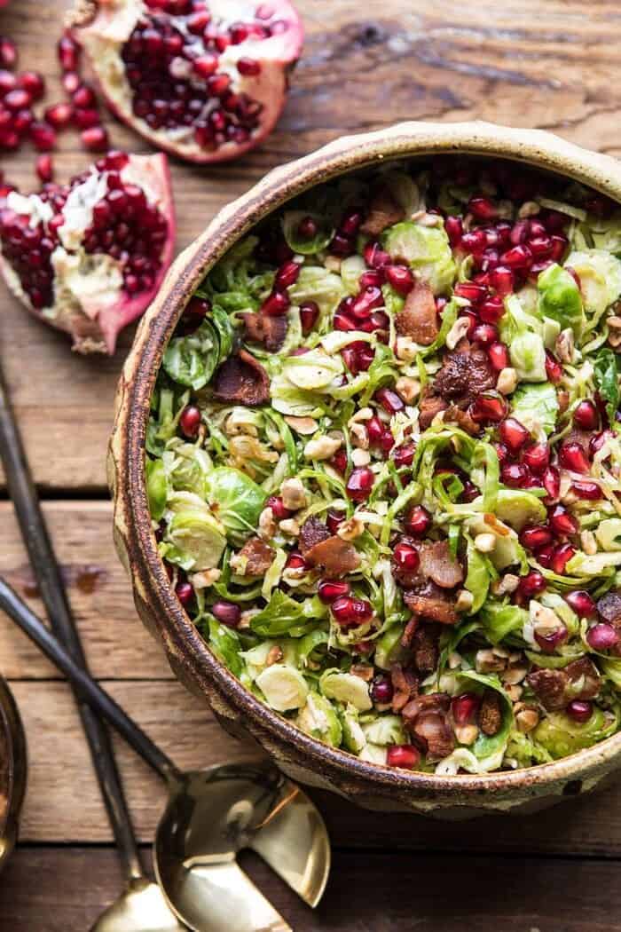 Shredded Brussels Sprout Bacon Salad with Warm Cider Vinaigrette | halfbakedharvest.com #brusselssprouts #salad #thanksgiving #fall #winter #healthy overhead close up photo of Shredded Brussels Sprout Bacon Salad with Warm Cider Vinaigrette