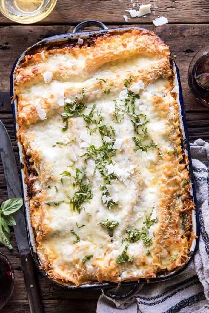 Pesto Bolognese Lasagna | halfbakedharvest.com #pasta #Italian #lasagna #cheese #holidayrecipes overhead photo of Pesto Bolognese Lasagna