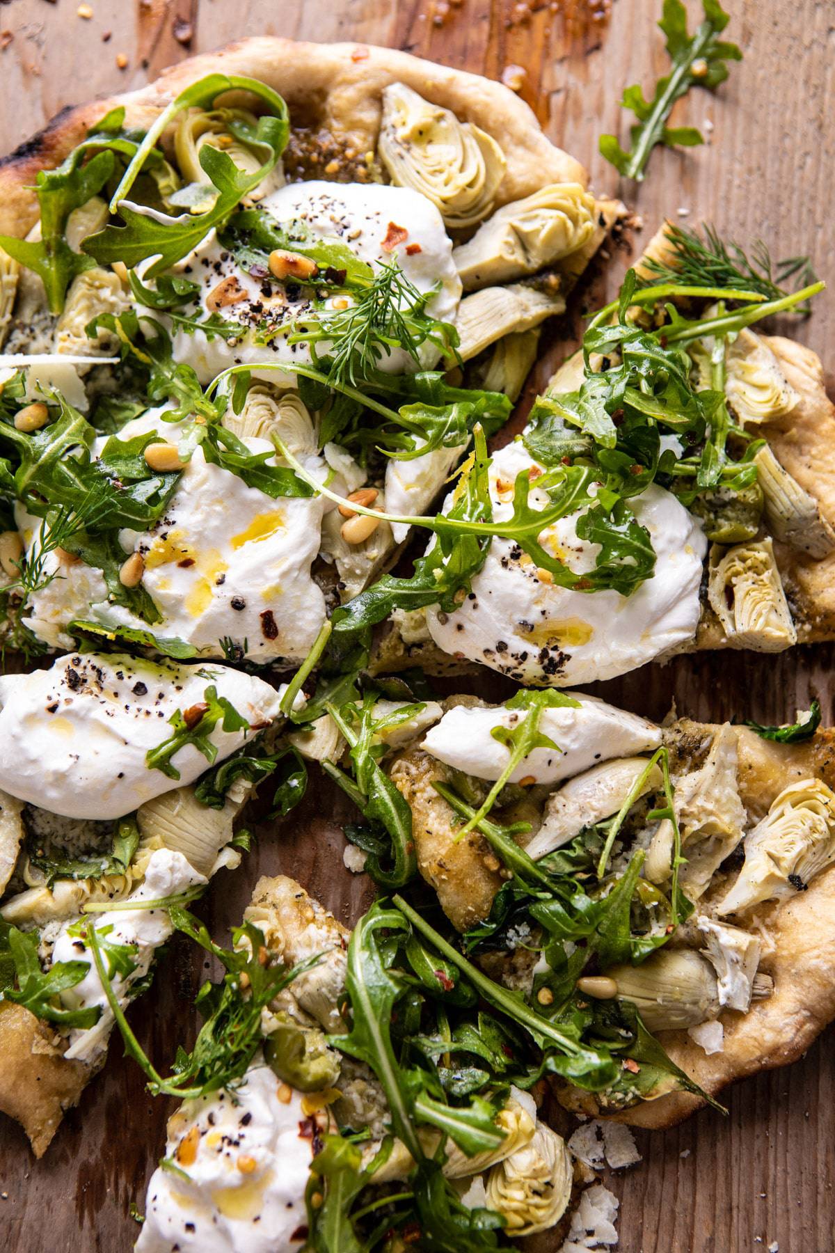 Artichoke Pesto and Burrata Pizza with Lemony Arugula | halfbakedharvest.com #pizza #healthy #burrata #easyrecipes