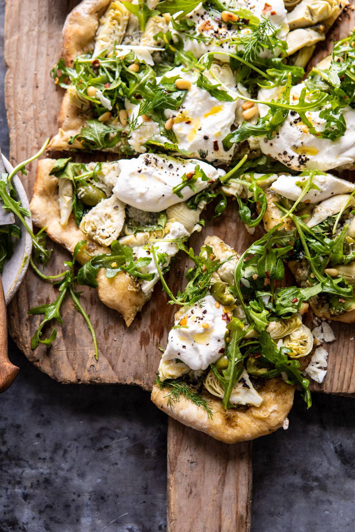 Artichoke Pesto and Burrata Pizza with Lemony Arugula | halfbakedharvest.com #pizza #healthy #burrata #easyrecipes