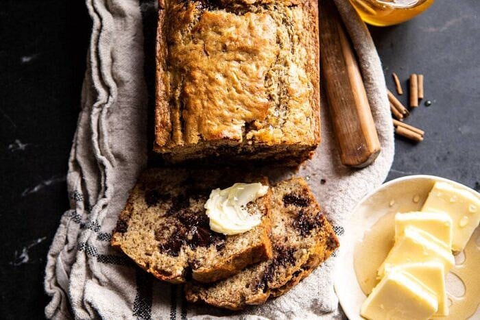 Chocolate Chunk Coconut Banana Bread | halfbakedharvest.com #bananabread #easyrecipes #healthyrecipes #chocolate #dessert horizontal photo of Chocolate Chunk Coconut Banana Bread