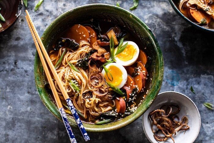 Feel Good Spicy Ramen with Sweet Potatoes and Crispy Shallots | halfbakedharvest.com #noodles #ramen #healthyrecipes #sweetpotatoes #winterrecipes #soup horizontal photo of Feel Good Spicy Ramen with Sweet Potatoes and Crispy Shallots