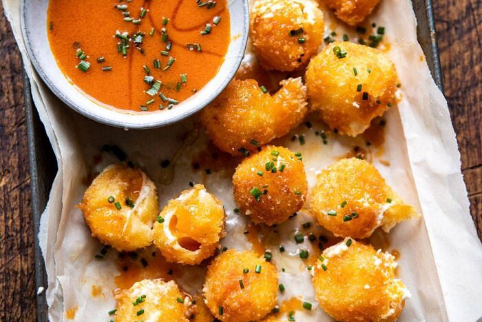 Fried Buffalo Goat Cheese Balls | halfbakedharvest.com #goatcheese #appetizers #superbowl #snacks horizontal photo of Fried Buffalo Goat Cheese Balls