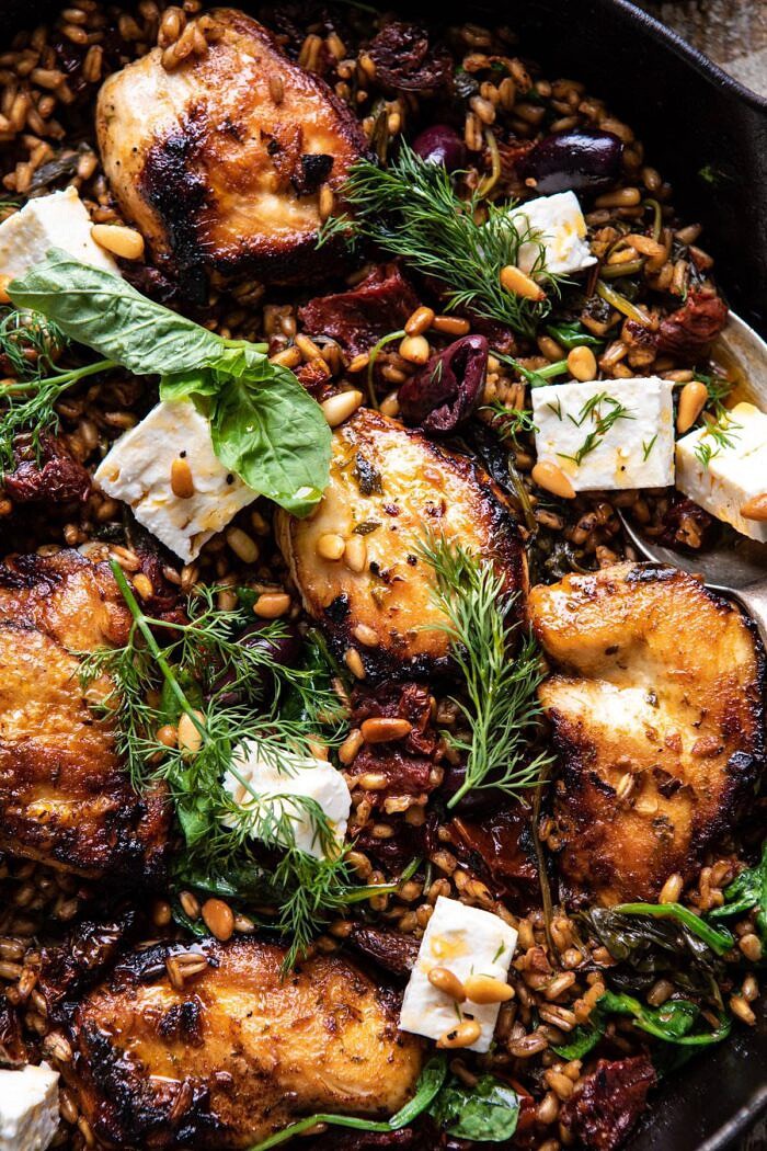 One Skillet Greek Sun-Dried Tomato Chicken and Farro | halfbakedharvest.com #skilletrecipes #chicken #healthyrecipes #onepan #easyrecipes close up photo of One Skillet Greek Sun-Dried Tomato Chicken and Farro