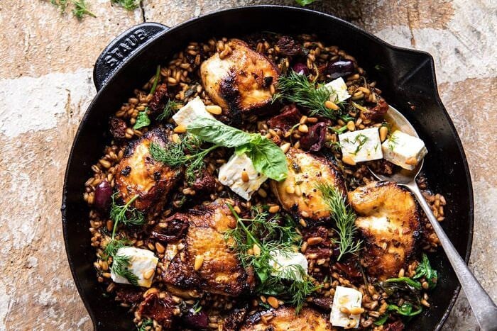 One Skillet Greek Sun-Dried Tomato Chicken and Farro | halfbakedharvest.com #skilletrecipes #chicken #healthyrecipes #onepan #easyrecipes horizontal photo of One Skillet Greek Sun-Dried Tomato Chicken and Farro