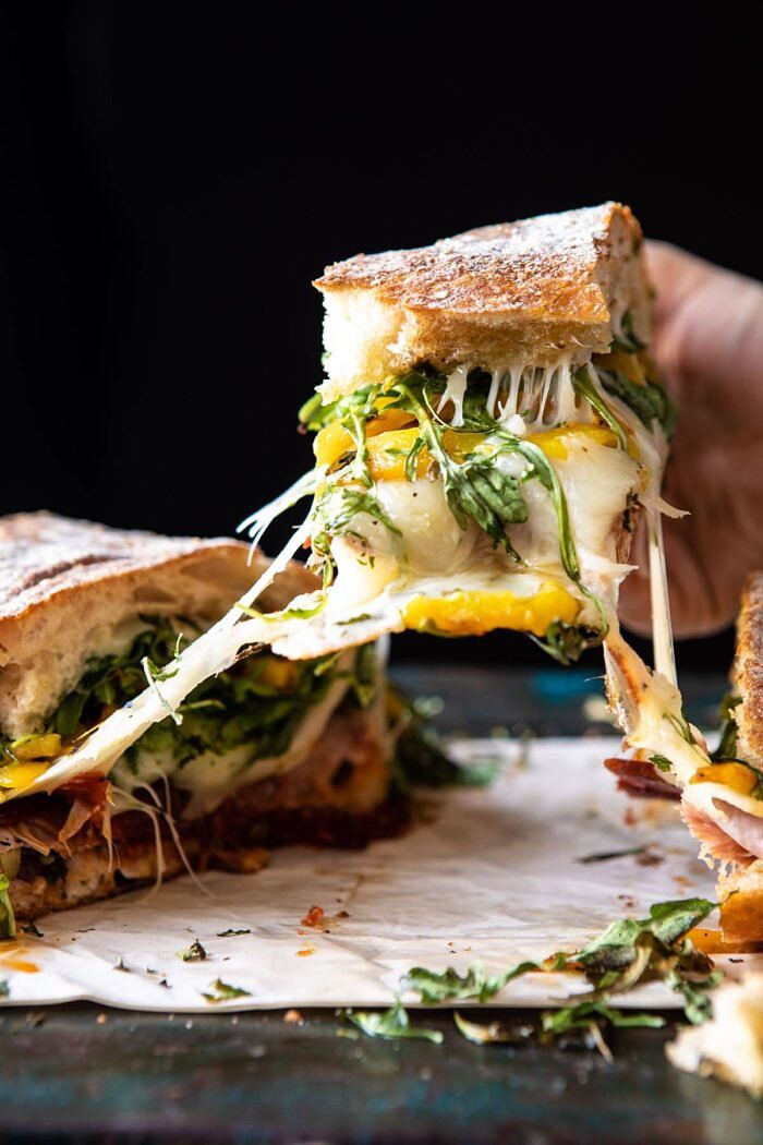 Party Size Italian Melt | halfbakedharvest.com #grilledcheese #easyrecipes #gameday side angled photo of Party Size Italian Melt being pulled up