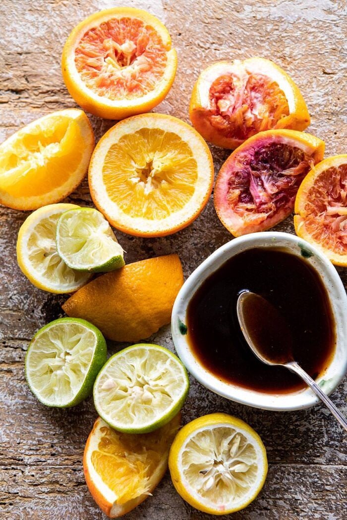 Sesame Crusted Cauliflower with Pomegranate Ponzu Sauce | halfbakedharvest.com #cauliflower #healthyrecipes #easyrecipes #vegetarian Pomegranate Ponzu Sauce with juiced oranges on table