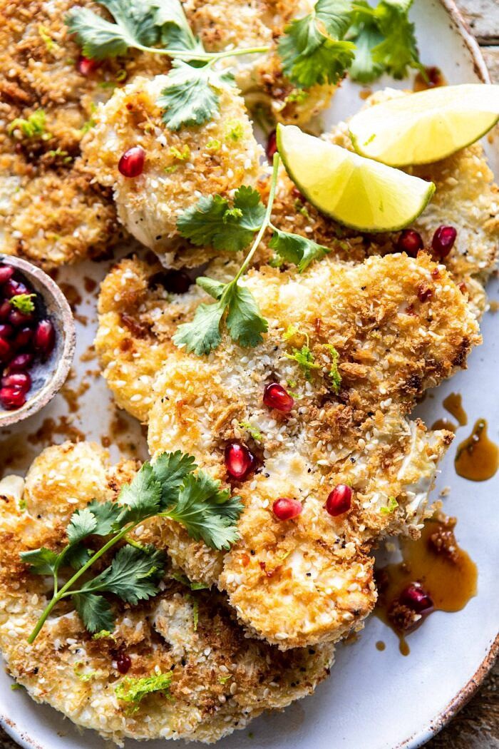Sesame Crusted Cauliflower with Pomegranate Ponzu Sauce | halfbakedharvest.com #cauliflower #healthyrecipes #easyrecipes #vegetarian overhead close up photo of Sesame Crusted Cauliflower with Pomegranate Ponzu Sauce
