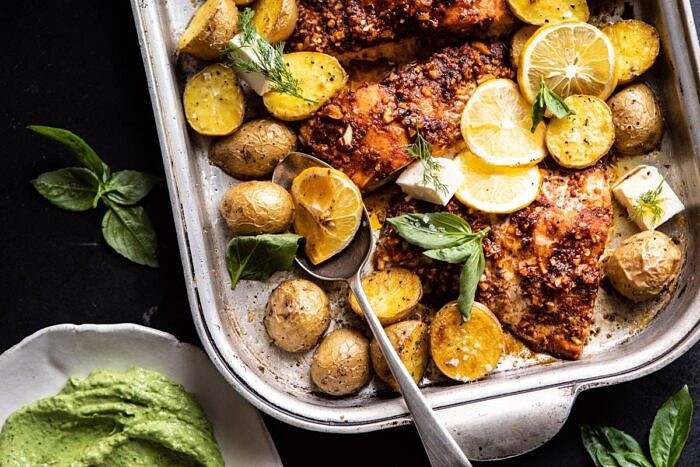horizontal photo of Sheet Pan Blackened Salmon Bowl with Potatoes on baking sheet