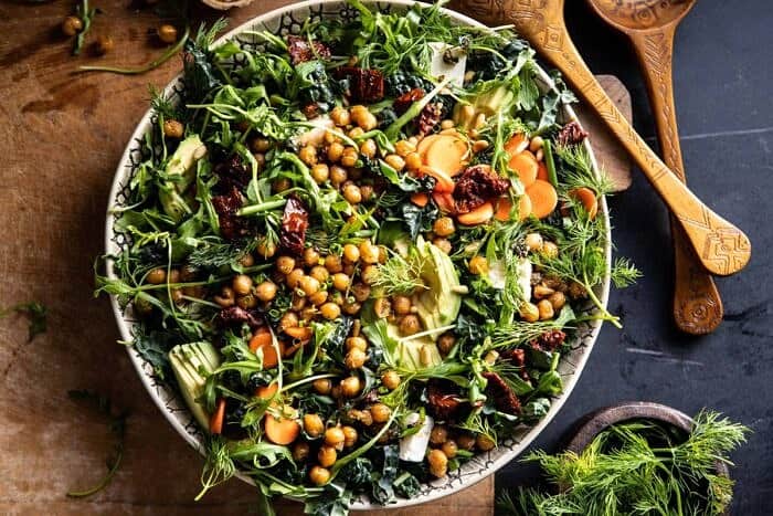Super Green Sun-Dried Tomato Herb Salad with Crispy Chickpeas | halfbakedharvest.com #healthyrecipes #salad #easyrecipes #chickpeas #feta horizontal photo of Super Green Sun-Dried Tomato Herb Salad with Crispy Chickpeas