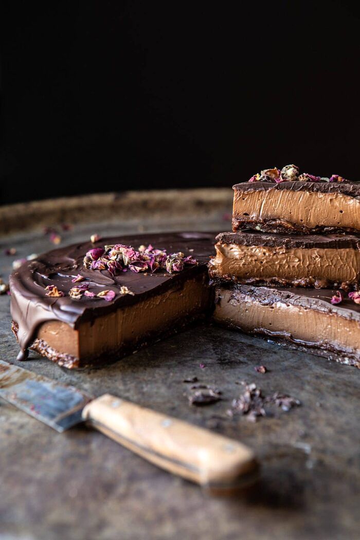 Vegan Triple Chocolate Mousse Cake | halfbakedharvest.com #chocolate #vegan #easyrecipes #dessert #cake #healthyrecipes side angle photo of Vegan Triple Chocolate Mousse Cake