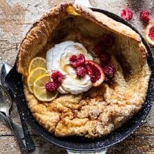 Whole Wheat Dutch Baby with Meyer Lemon Whipped Ricotta | halfbakedharvest.com #brunch #breakfast #easyrecipes #dutchbaby #lemon #ricotta