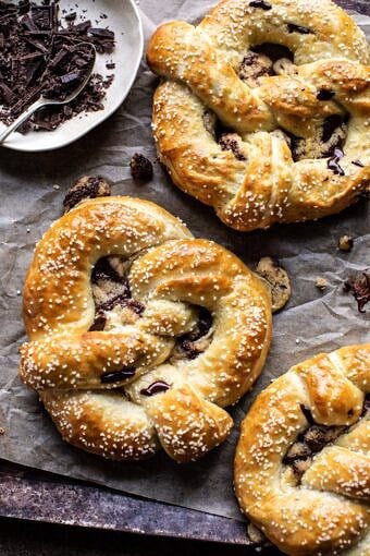 Chocolate Chip Cookie Stuffed Soft Pretzels | halfbakedharvest.com #pretzels #cookies #chocolatechipcookies #dessert #superbowl