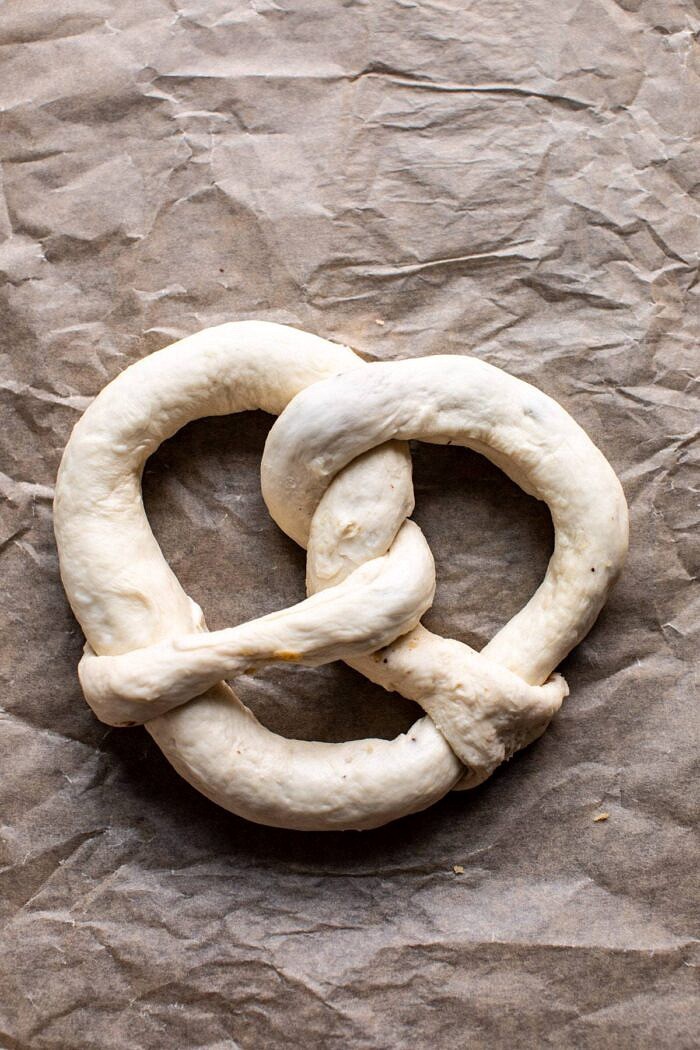 Chocolate Chip Cookie Stuffed Soft Pretzels | halfbakedharvest.com #pretzels #cookies #chocolatechipcookies #dessert #superbowl Chocolate Chip Cookie Stuffed Soft Pretzel before baking