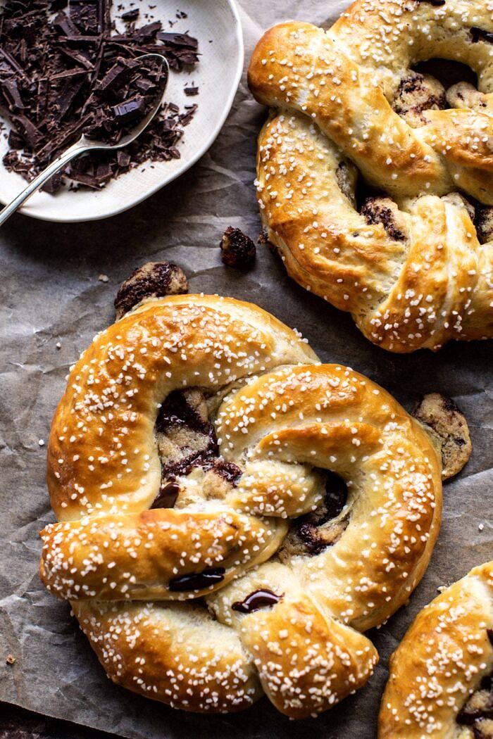 Chocolate Chip Cookie Stuffed Soft Pretzels | halfbakedharvest.com #pretzels #cookies #chocolatechipcookies #dessert #superbowl overhead close up photo of Chocolate Chip Cookie Stuffed Soft Pretzels