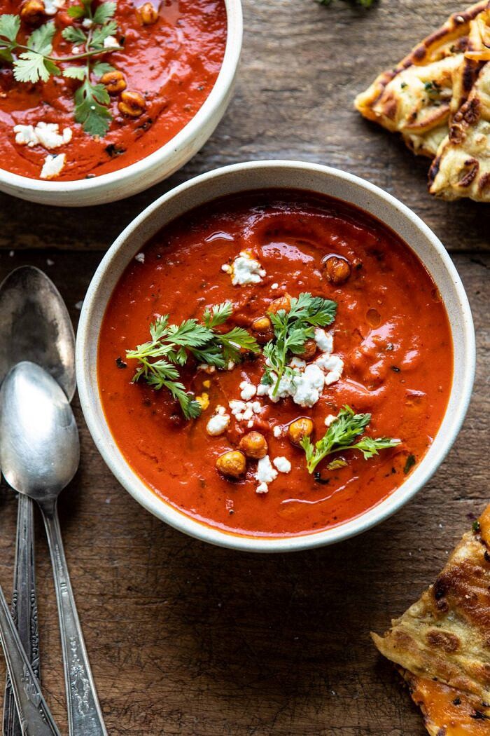 Creamy Moroccan Tomato Soup | halfbakedharvest.com #tomatosoup #easyrecipes #healthy #soup #vegan overhead close up photo of Creamy Moroccan Tomato Soup