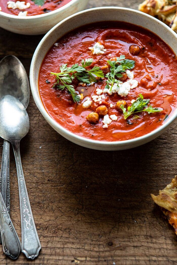 Creamy Moroccan Tomato Soup | halfbakedharvest.com #tomatosoup #easyrecipes #healthy #soup #vegan side angled photo of Creamy Moroccan Tomato Soup