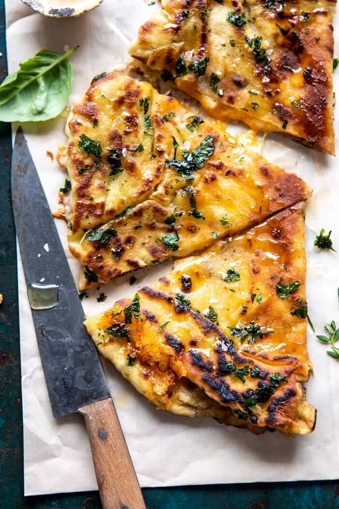 Garlic Naan Grilled Cheese | halfbakedharvest.com #naan #grilledcheese #easyrecipes side angled close up photo of Garlic Naan Grilled Cheese