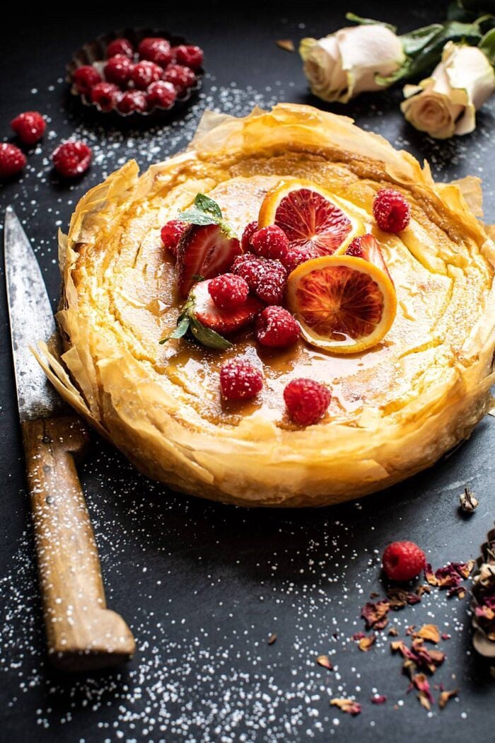 Whipped Lemon Ricotta Cheesecake | halfbakedharvest.com #cheesecake #easyrecipe #ricotta #deesert #cake #valentinesday Whipped Lemon Ricotta Cheesecake before slicing