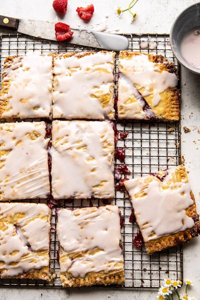 Giant Strawberries n' Cream Pop Tart | halfbakedharvest.com #brunch #pie #dessert #breakfast Giant Strawberries n' Cream Pop Tart with pieces missing