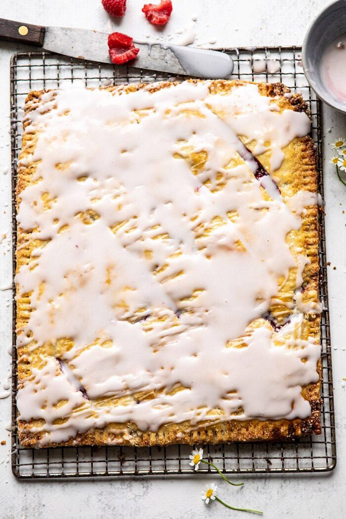 Giant Strawberries n' Cream Pop Tart | halfbakedharvest.com #brunch #pie #dessert #breakfast Giant Strawberries n' Cream Pop Tart after baking before being cut