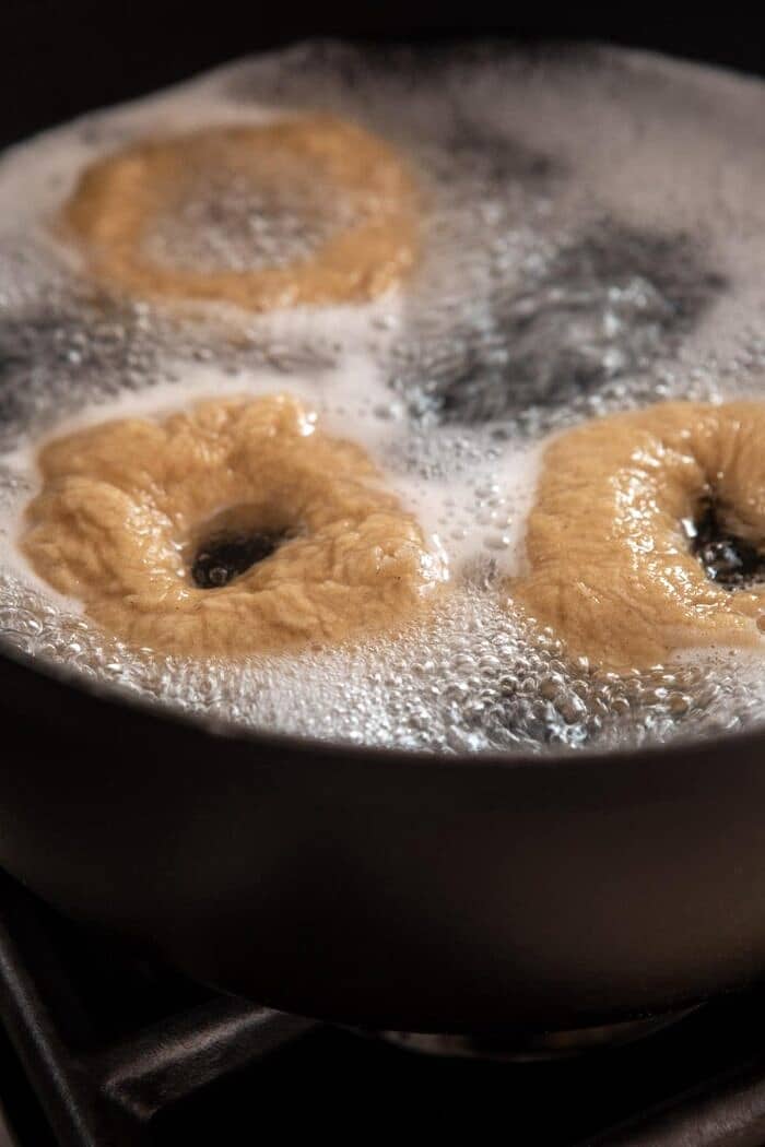 Homemade Cinnamon Crunch Bagels | halfbakedharvest.com #homemade #bagels #easyrecipes #brunch #breakfast bageling boiling in water