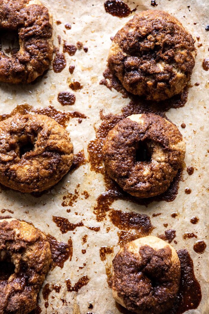 Homemade Cinnamon Crunch Bagels | halfbakedharvest.com #homemade #bagels #easyrecipes #brunch #breakfast Homemade Cinnamon Crunch Bagels on baking sheet