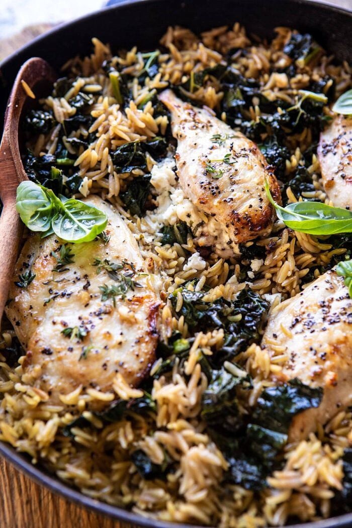 One Skillet Goat Cheese Stuffed Chicken and Orzo | halfbakedharvest.com #skilletchicken #skilletrecipes #easyrecipes #dinner overhead side angled photo of One Skillet Goat Cheese Stuffed Chicken and Orzo