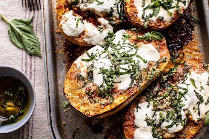 Spicy Tomato Parmesan Stuffed Spaghetti Squash | halfbakedharvest.com #spaghettisquash #healthyrecipes #easyrecipes #dinner horizontal photo of Spicy Tomato Parmesan Stuffed Spaghetti Squash