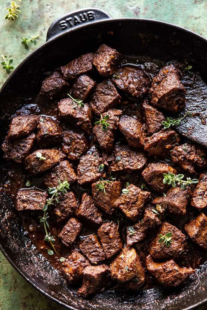 30 Minute Cajun Butter Steak and Peppers | halfbakedharvest.com #easyrecipes #steak #dinner #familyrecipes 30 Minute Cajun Butter Steak in skillet