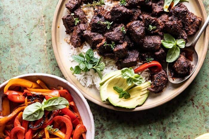 30 Minute Cajun Butter Steak and Peppers | halfbakedharvest.com #easyrecipes #steak #dinner #familyrecipes horizontal photo of 30 Minute Cajun Butter Steak and Peppers