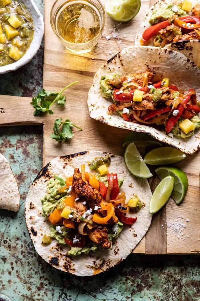 30 Minute Chicken Fajitas with Roasted Pineapple Salsa Verde | halfbakedharvest.com #chickenrecipes #mexicanrecipes #dinner #fajitas #healthyrecipes overhead close up photo of 30 Minute Chicken Fajitas with Roasted Pineapple Salsa Verde