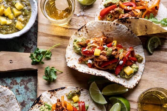 30 Minute Chicken Fajitas with Roasted Pineapple Salsa Verde | halfbakedharvest.com #chickenrecipes #mexicanrecipes #dinner #fajitas #healthyrecipes horizontal photo of 30 Minute Chicken Fajitas with Roasted Pineapple Salsa Verde