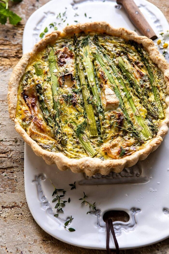 Asparagus and Brie Quiche | halfbakedharvest.com #quiche #brunch #springrecipes #easter side angled photo of Asparagus and Brie Quiche
