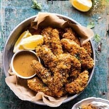 Baked Black Pepper Ranch Chicken Fingers with Honey Mustard | halfbakedharvest.com #chicken #easyrecipes #dinner #chickenfingers