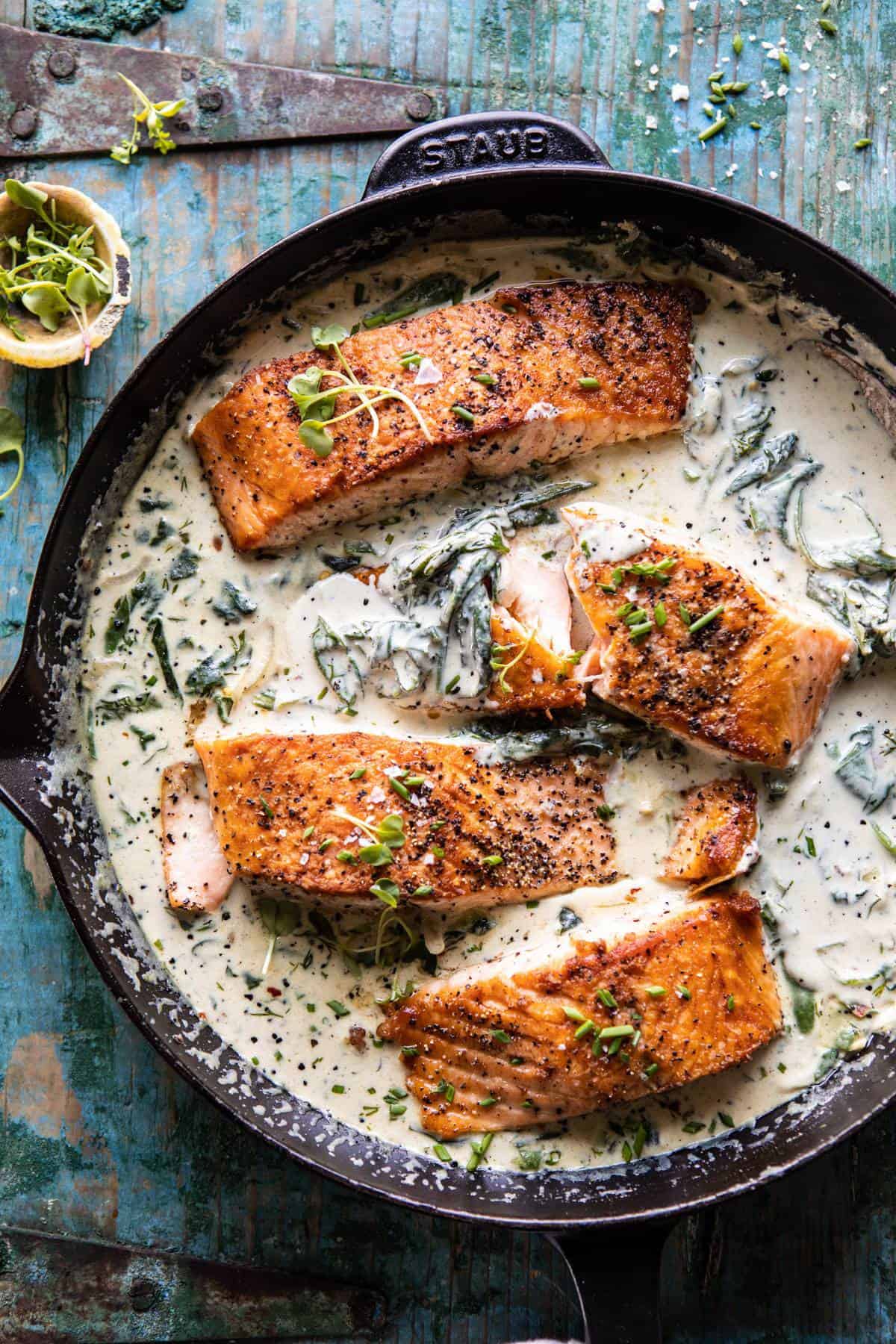 Garlic Butter Creamed Spinach Salmon | halfbakedharvest.com #salmon #easyrecipes #seafood #dinner