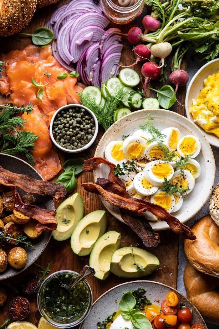 Ultimate Spring Brunch Board | halfbakedharvest.com #brunch #breakfast #potatoes #spring #summer #easter #mothersday overhead photo of Ultimate Spring Brunch Board, close up on hard board eggs