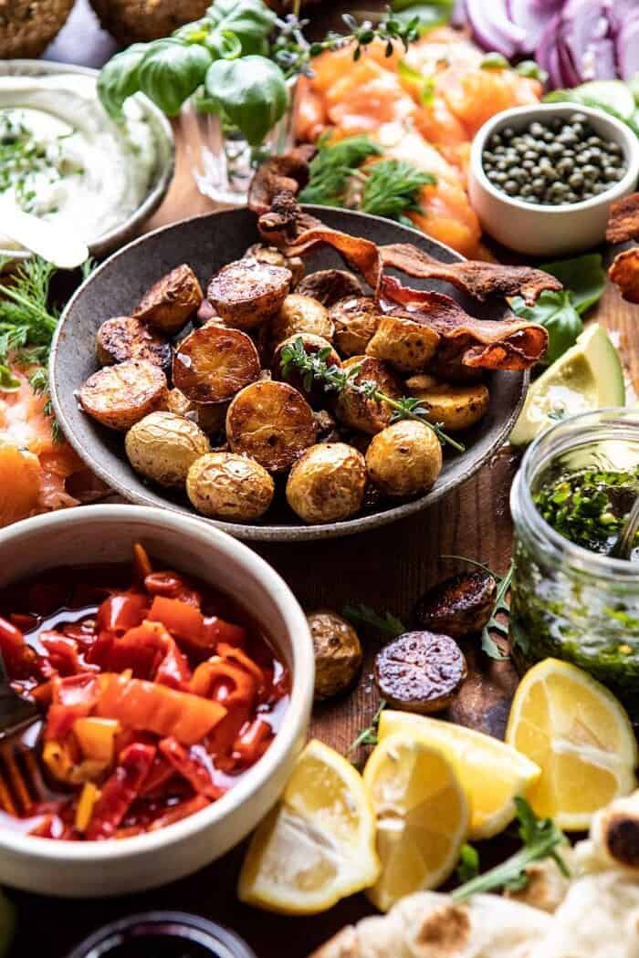 Ultimate Spring Brunch Board | halfbakedharvest.com #brunch #breakfast #potatoes #spring #summer #easter #mothersday side angle photo Ultimate Spring Brunch Board, close up on roasted potatoes