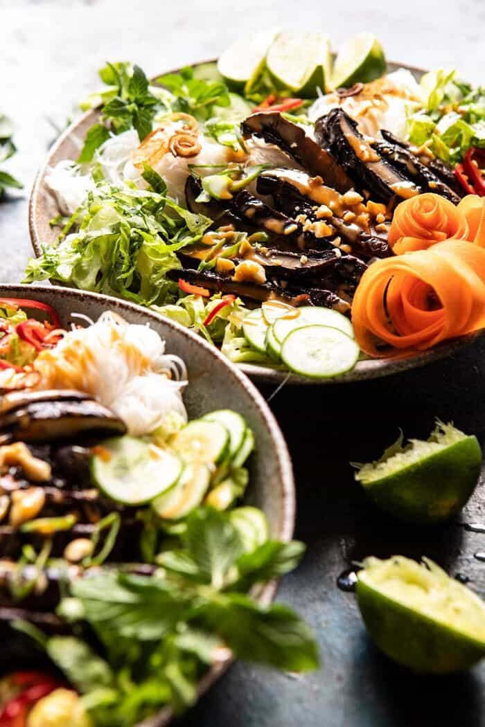 Vietnamese Rice Noodle Salad with Mushrooms and Spicy Peanut Vinaigrette | halfbakedharvest.com #healthy #salad #springrecipes #Asian side angled photo of Vietnamese Rice Noodle Salad with Mushrooms and Spicy Peanut Vinaigrette