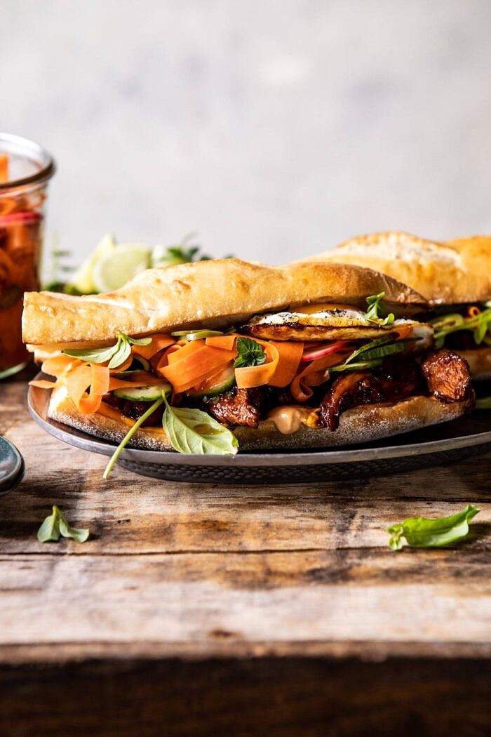 30 Minute Basil Chicken Banh Mi Sandwich | halfbakedharvest.com #easyrecipe #healthyrecipes #chicken #thai #Vietnamese front on photo of 30 Minute Basil Chicken Banh Mi Sandwich