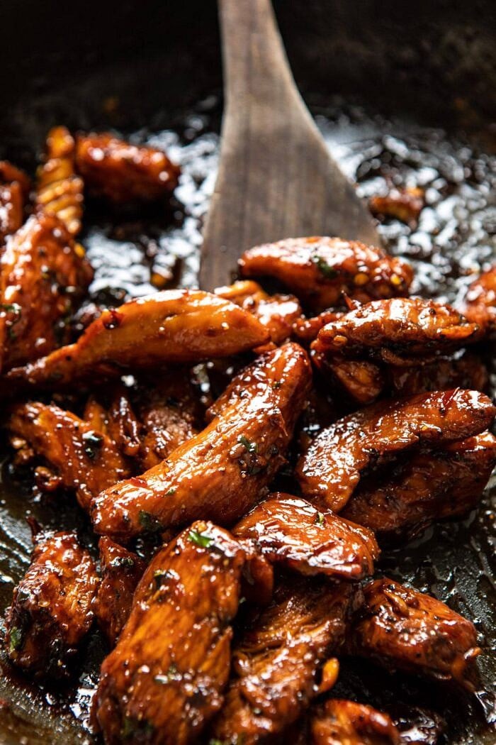 30 Minute Basil Chicken Banh Mi Sandwich | halfbakedharvest.com #easyrecipe #healthyrecipes #chicken #thai #Vietnamese caramelized Basil Chicken in skillet